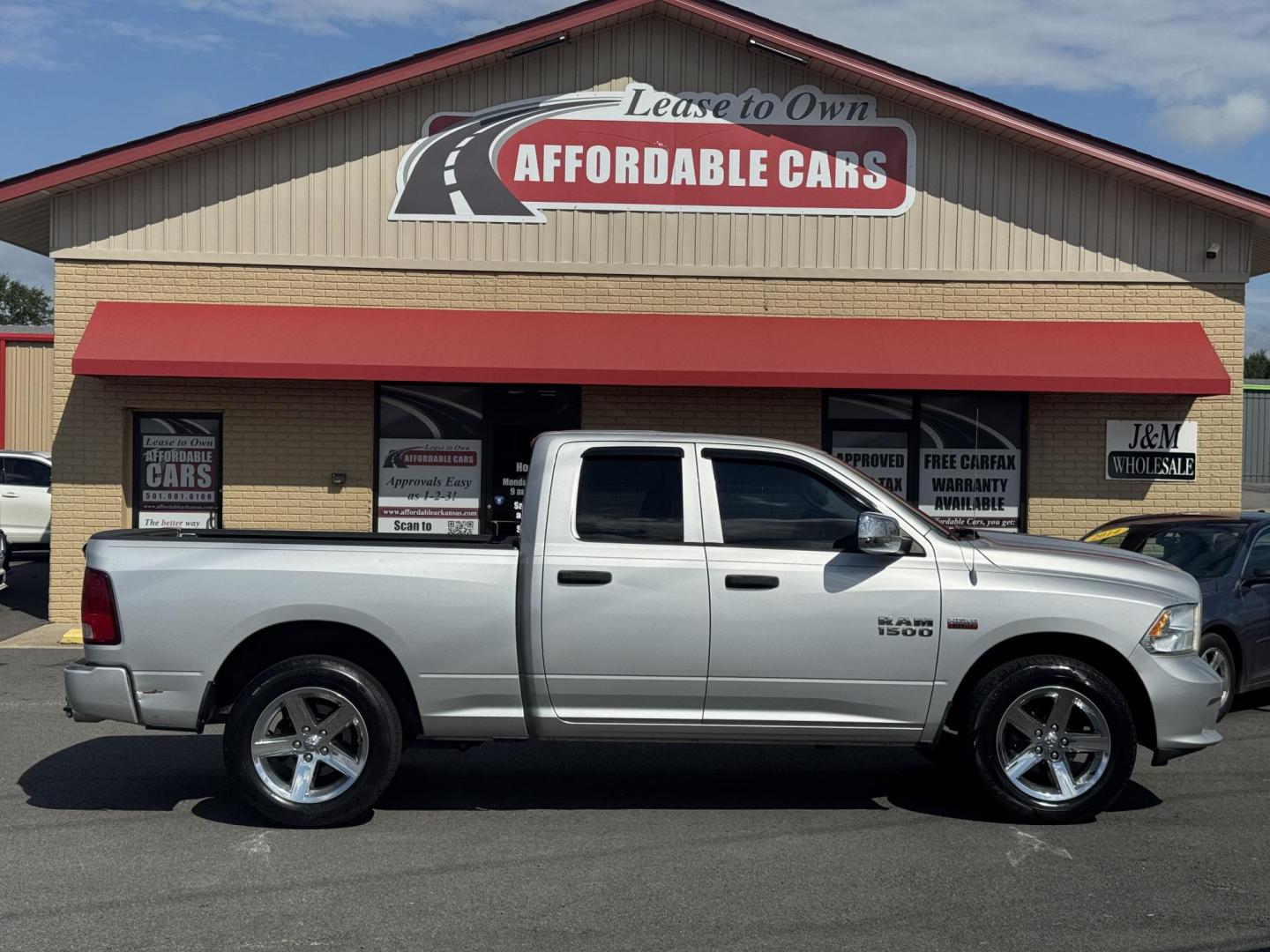 2013 Silver Ram 1500 Quad Cab (1C6RR6FT2DS) with an V8, HEMI, 5.7 Liter engine, Automatic, 6-Spd transmission, located at 8008 Warden Rd, Sherwood, AR, 72120, (501) 801-6100, 34.830078, -92.186684 - Photo#0