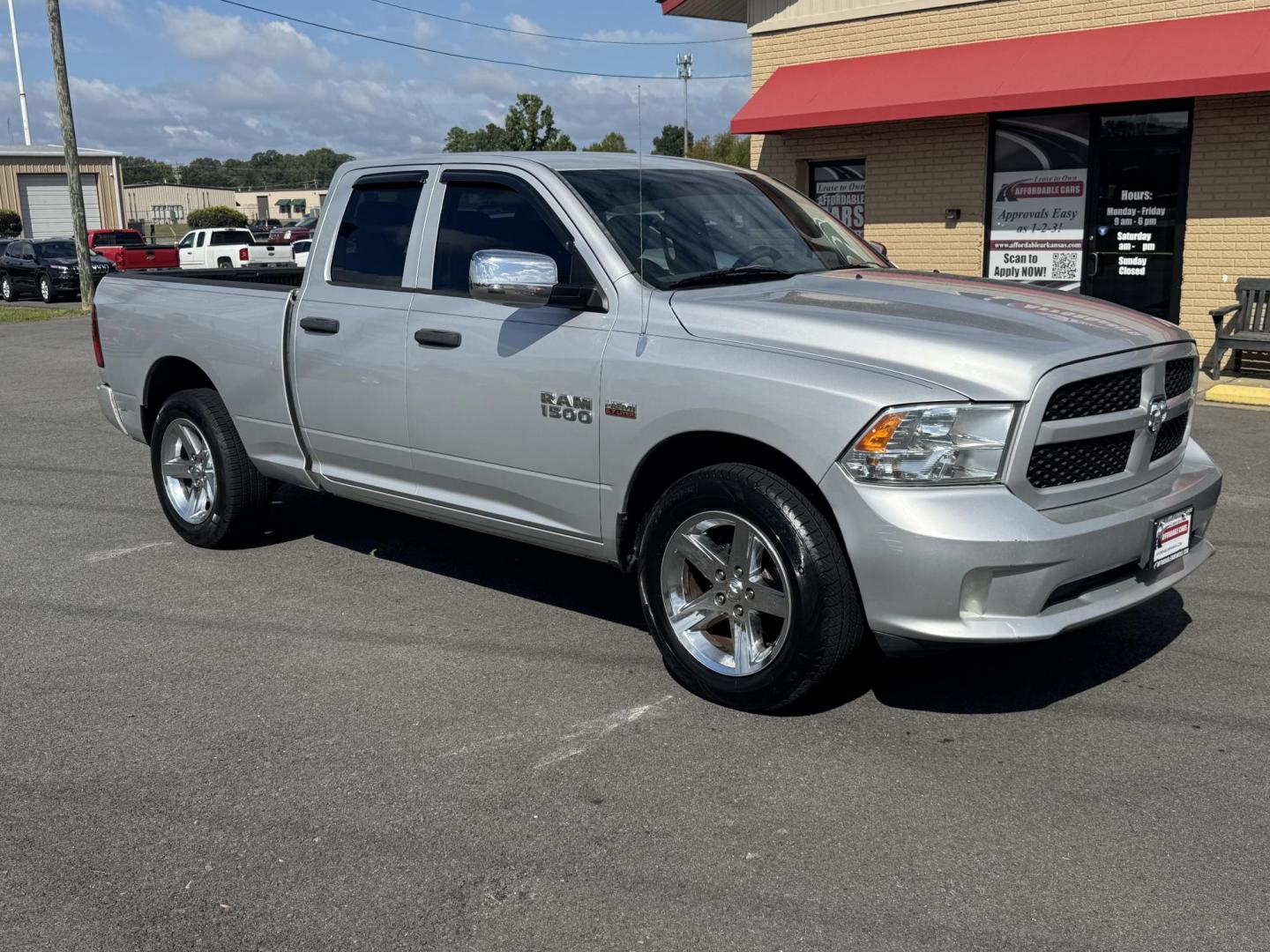 2013 Silver Ram 1500 Quad Cab (1C6RR6FT2DS) with an V8, HEMI, 5.7 Liter engine, Automatic, 6-Spd transmission, located at 8008 Warden Rd, Sherwood, AR, 72120, (501) 801-6100, 34.830078, -92.186684 - Photo#1