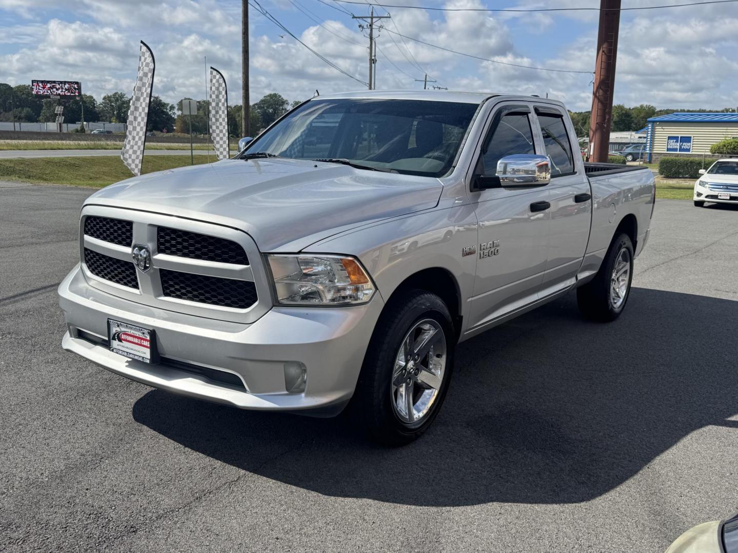 2013 Silver Ram 1500 Quad Cab (1C6RR6FT2DS) with an V8, HEMI, 5.7 Liter engine, Automatic, 6-Spd transmission, located at 8008 Warden Rd, Sherwood, AR, 72120, (501) 801-6100, 34.830078, -92.186684 - Photo#3