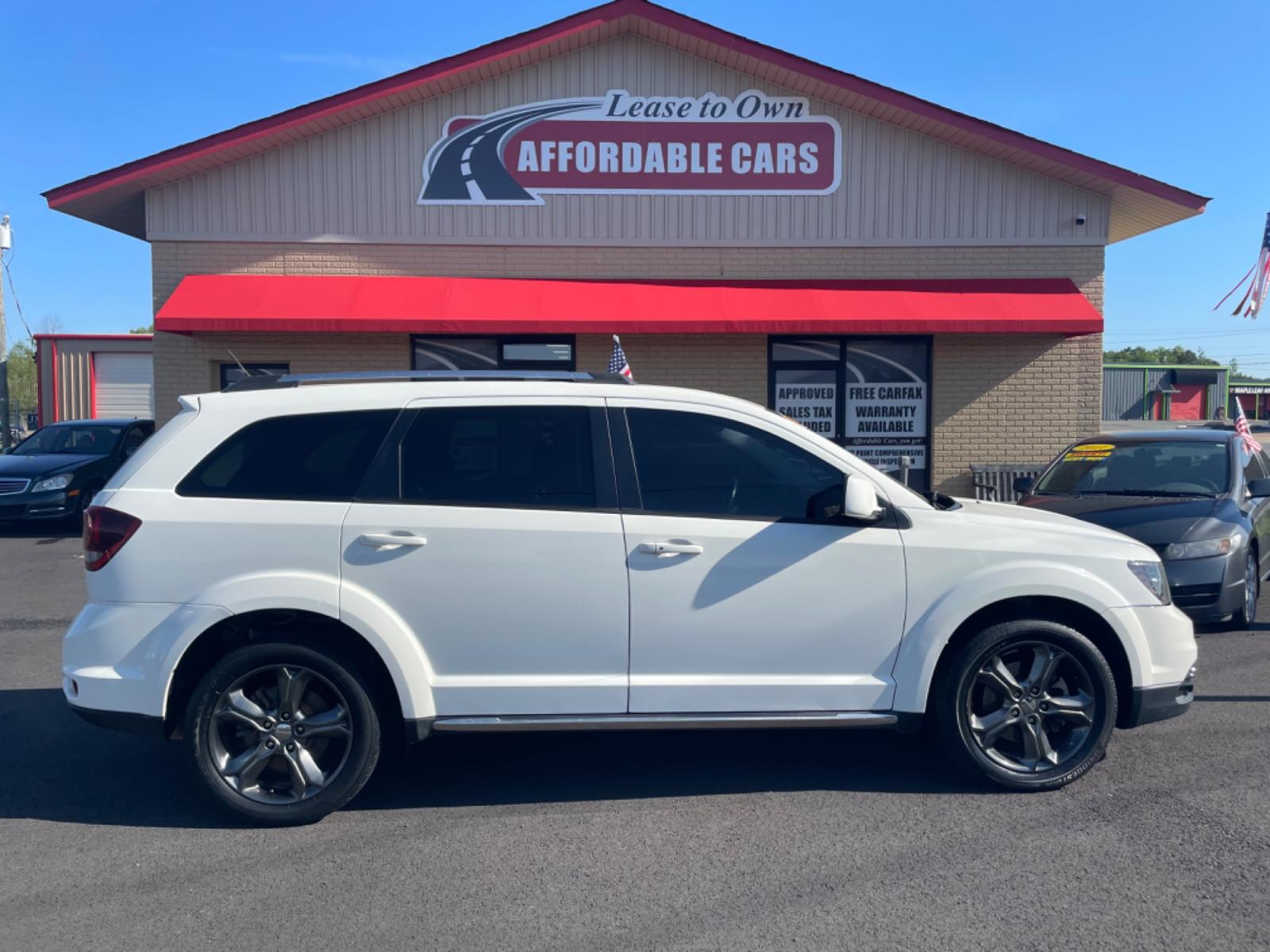 2015 White Dodge Journey (3C4PDCGG7FT) with an V6, 3.6 Liter engine, Automatic, 6-Spd w/AutoStick transmission, located at 8008 Warden Rd, Sherwood, AR, 72120, (501) 801-6100, 34.830078, -92.186684 - Photo #0
