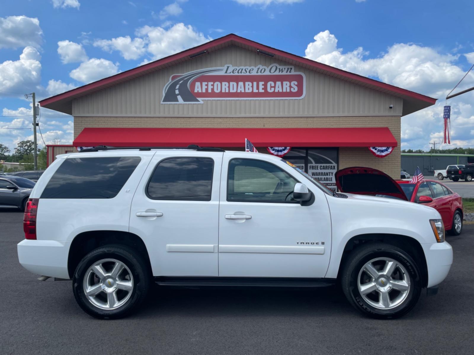 2007 White Chevrolet Tahoe (1GNFK13097R) with an V8, 5.3 Liter engine, Automatic transmission, located at 8008 Warden Rd, Sherwood, AR, 72120, (501) 801-6100, 34.830078, -92.186684 - Photo #0