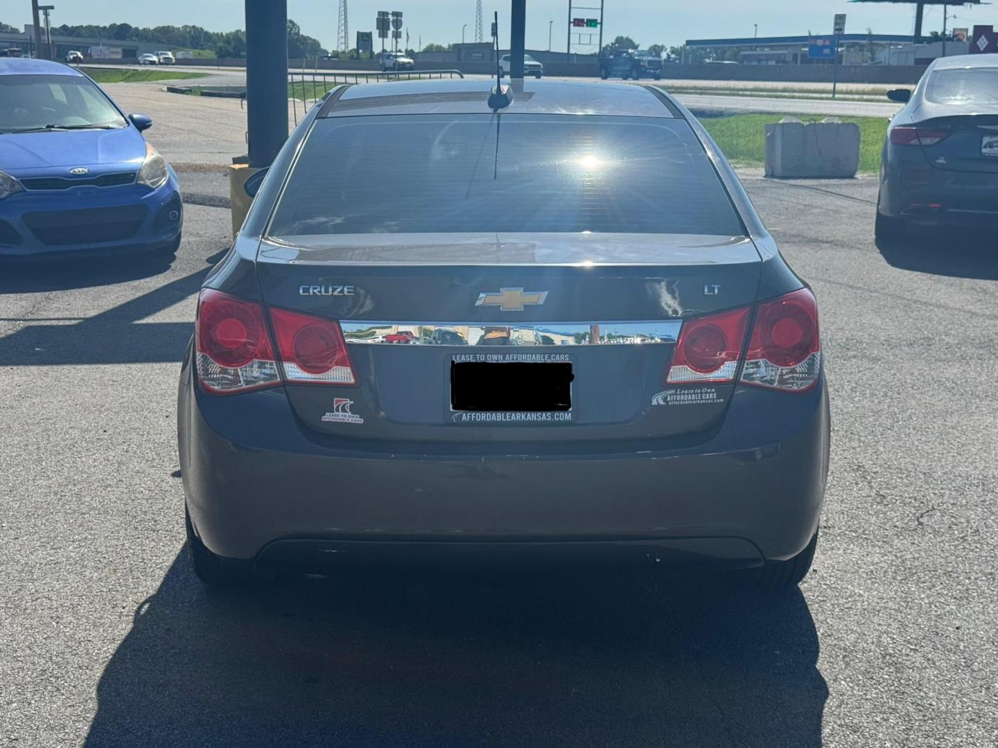 2016 Gray Chevrolet Cruze Limited (1G1PE5SBXG7) with an 4-Cyl, ECOTEC, 1.4T engine, Auto, 6-Spd Overdrive transmission, located at 8008 Warden Rd, Sherwood, AR, 72120, (501) 801-6100, 34.830078, -92.186684 - Photo#6
