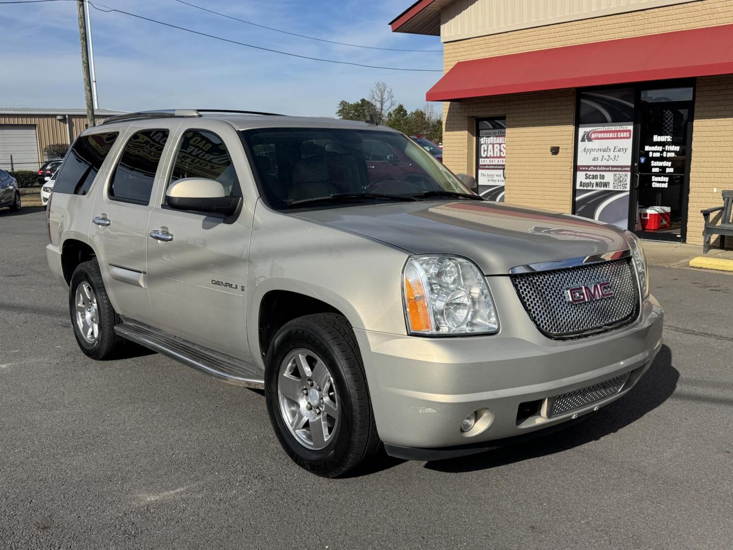 2007 Gold GMC Yukon (1GKFK63807J) with an V8, 6.2 Liter engine, Automatic transmission, located at 8008 Warden Rd, Sherwood, AR, 72120, (501) 801-6100, 34.830078, -92.186684 - Photo#1
