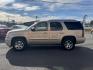 2007 Gold GMC Yukon (1GKFK63807J) with an V8, 6.2 Liter engine, Automatic transmission, located at 8008 Warden Rd, Sherwood, AR, 72120, (501) 801-6100, 34.830078, -92.186684 - Photo#4