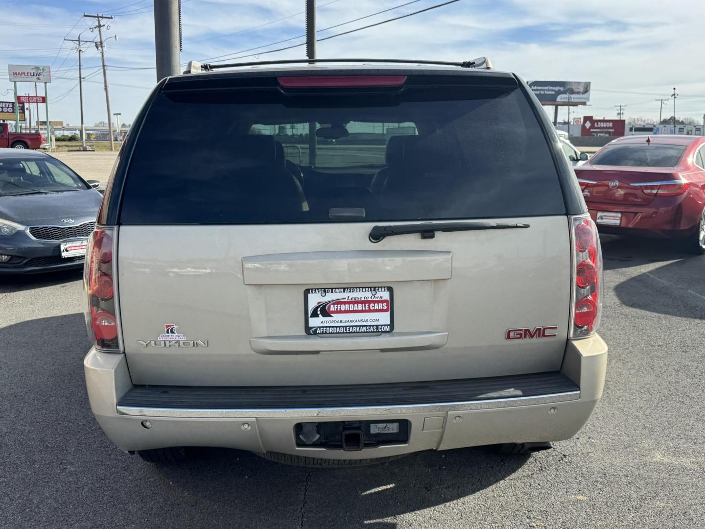 2007 Gold GMC Yukon (1GKFK63807J) with an V8, 6.2 Liter engine, Automatic transmission, located at 8008 Warden Rd, Sherwood, AR, 72120, (501) 801-6100, 34.830078, -92.186684 - Photo#6