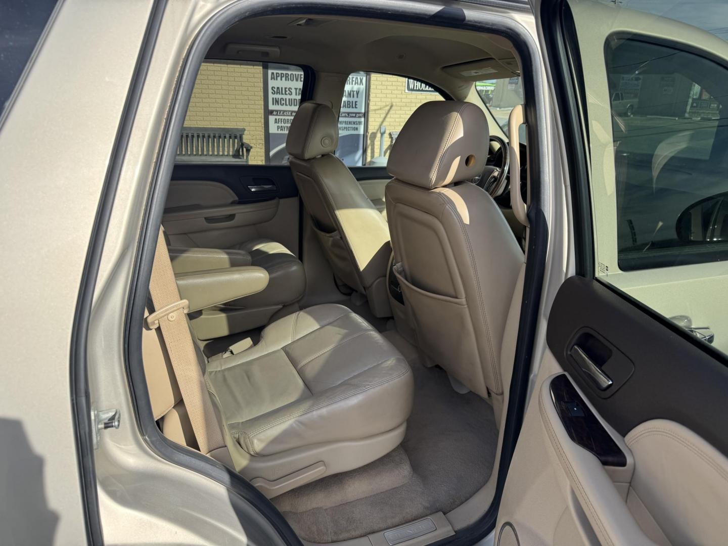 2007 Gold GMC Yukon (1GKFK63807J) with an V8, 6.2 Liter engine, Automatic transmission, located at 8008 Warden Rd, Sherwood, AR, 72120, (501) 801-6100, 34.830078, -92.186684 - Photo#9