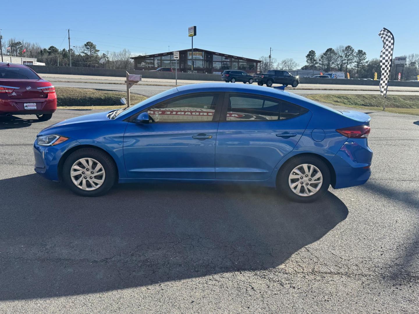 2017 Blue Hyundai Elantra (KMHD74LF7HU) with an 4-Cyl, 2.0 Liter engine, Auto, 6-Spd Shiftronic transmission, located at 8008 Warden Rd, Sherwood, AR, 72120, (501) 801-6100, 34.830078, -92.186684 - Photo#4