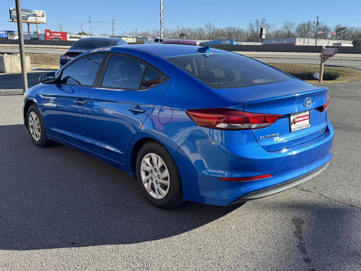 2017 Blue Hyundai Elantra (KMHD74LF7HU) with an 4-Cyl, 2.0 Liter engine, Auto, 6-Spd Shiftronic transmission, located at 8008 Warden Rd, Sherwood, AR, 72120, (501) 801-6100, 34.830078, -92.186684 - Photo#5