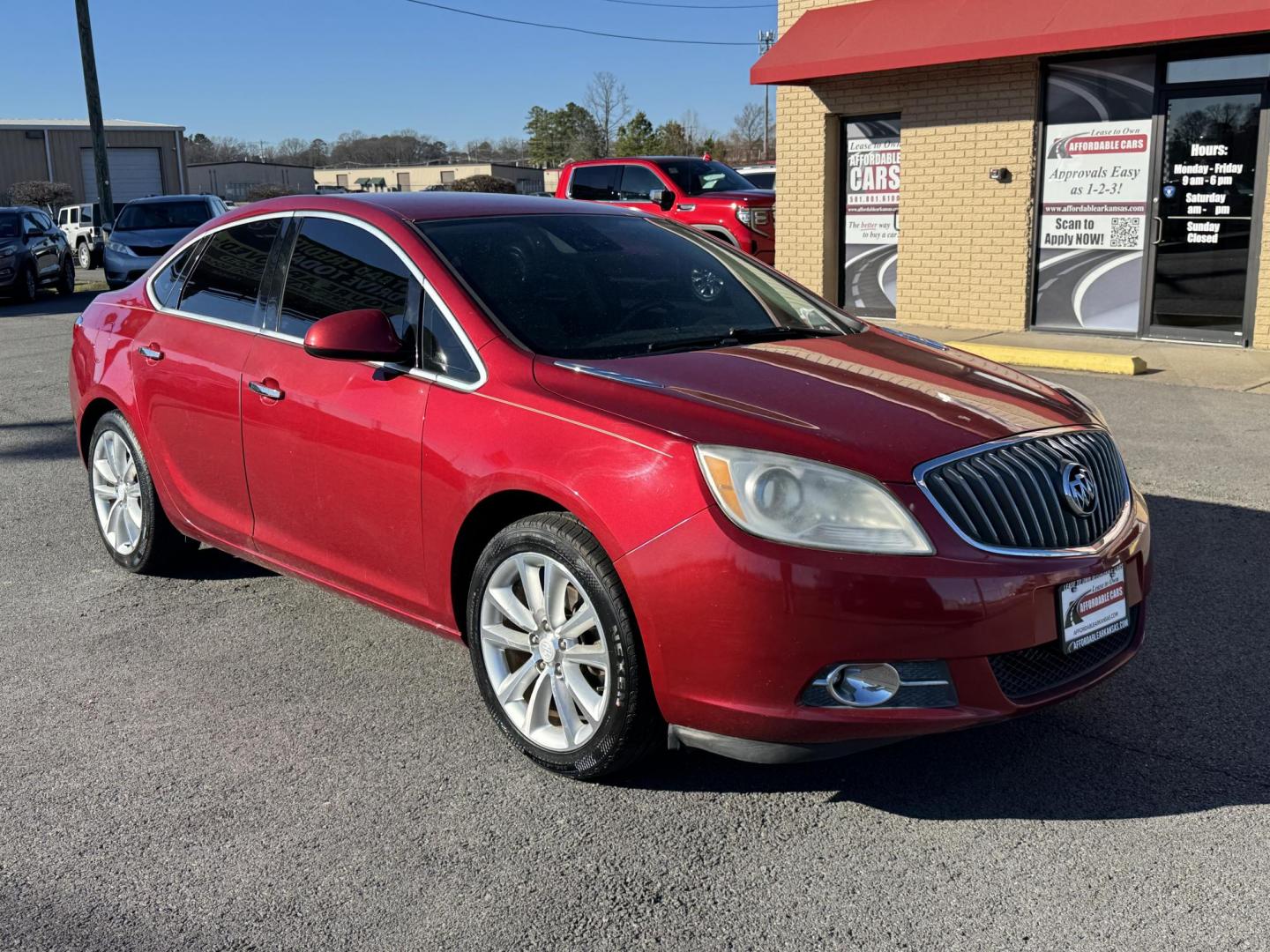 2014 Maroon Buick Verano (1G4PR5SK6E4) with an 4-Cyl, ECOTEC, 2.4 Liter engine, Auto, 6-Spd w/Shft Ctrl transmission, located at 8008 Warden Rd, Sherwood, AR, 72120, (501) 801-6100, 34.830078, -92.186684 - Photo#1