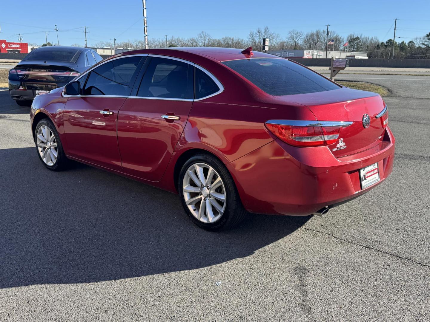 2014 Maroon Buick Verano (1G4PR5SK6E4) with an 4-Cyl, ECOTEC, 2.4 Liter engine, Auto, 6-Spd w/Shft Ctrl transmission, located at 8008 Warden Rd, Sherwood, AR, 72120, (501) 801-6100, 34.830078, -92.186684 - Photo#5