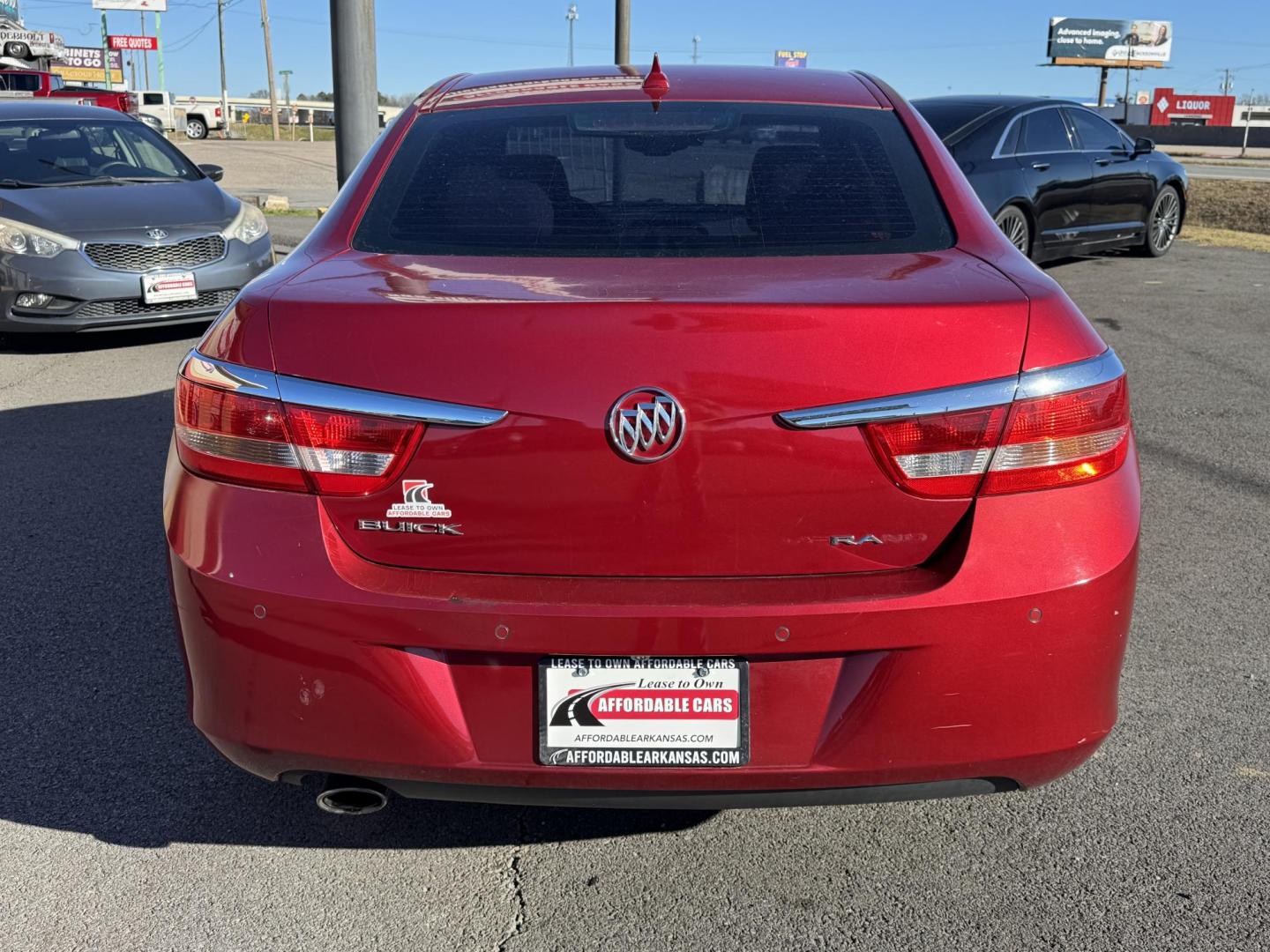 2014 Maroon Buick Verano (1G4PR5SK6E4) with an 4-Cyl, ECOTEC, 2.4 Liter engine, Auto, 6-Spd w/Shft Ctrl transmission, located at 8008 Warden Rd, Sherwood, AR, 72120, (501) 801-6100, 34.830078, -92.186684 - Photo#6