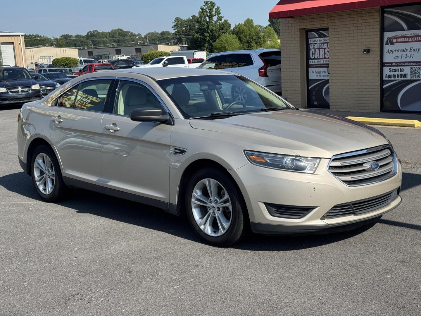 2018 Gold Ford Taurus (1FAHP2D86JG) with an V6, 3.5 Liter engine, Automatic, 6-Spd w/SelectShift transmission, located at 8008 Warden Rd, Sherwood, AR, 72120, (501) 801-6100, 34.830078, -92.186684 - Photo#1