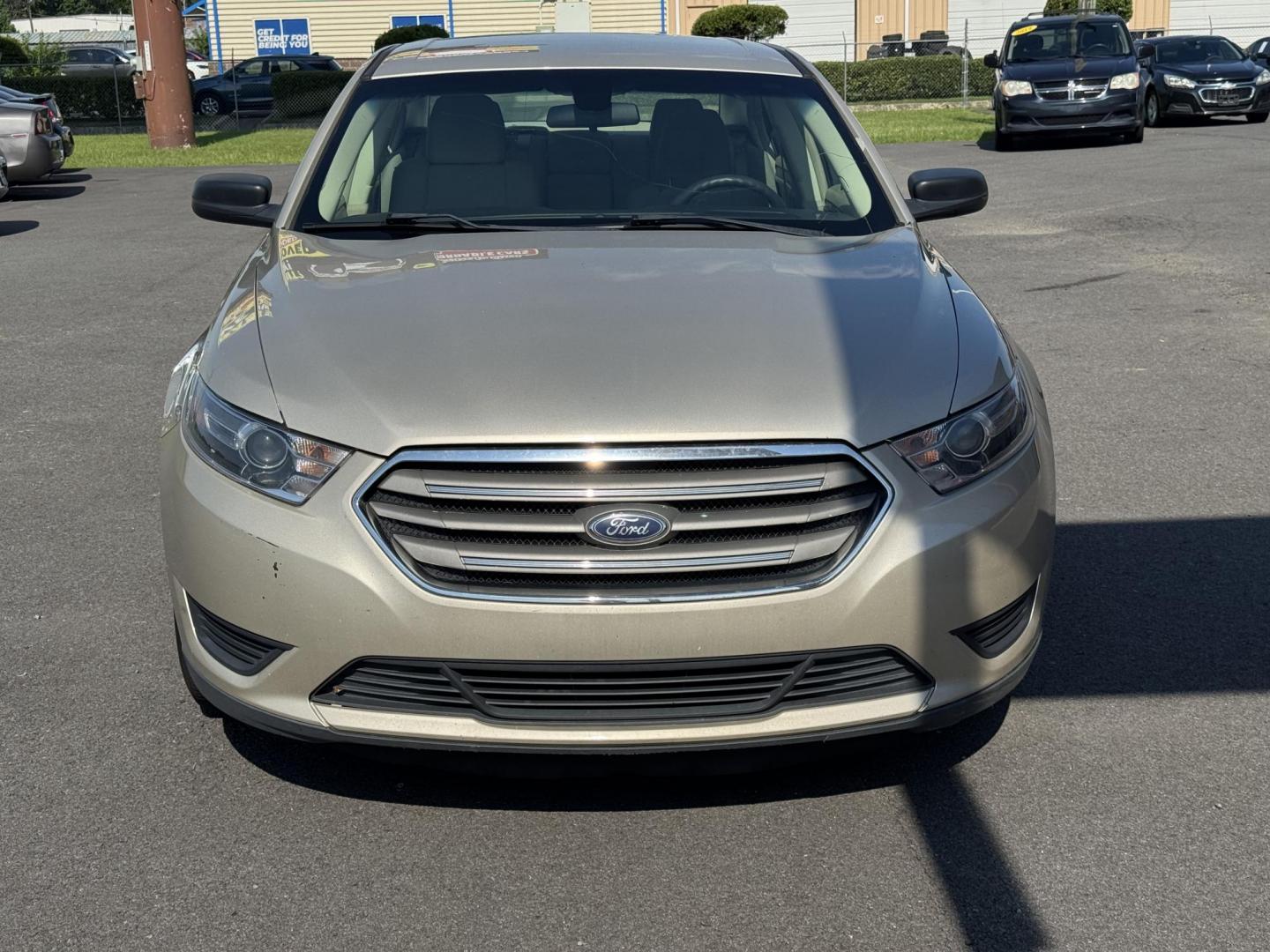 2018 Gold Ford Taurus (1FAHP2D86JG) with an V6, 3.5 Liter engine, Automatic, 6-Spd w/SelectShift transmission, located at 8008 Warden Rd, Sherwood, AR, 72120, (501) 801-6100, 34.830078, -92.186684 - Photo#2
