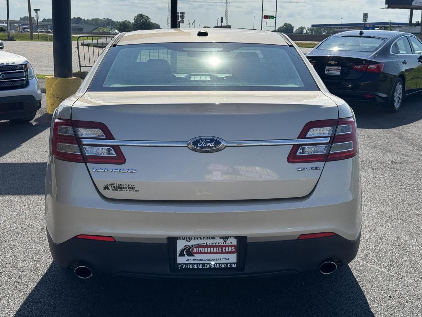 2018 Gold Ford Taurus (1FAHP2D86JG) with an V6, 3.5 Liter engine, Automatic, 6-Spd w/SelectShift transmission, located at 8008 Warden Rd, Sherwood, AR, 72120, (501) 801-6100, 34.830078, -92.186684 - Photo#6