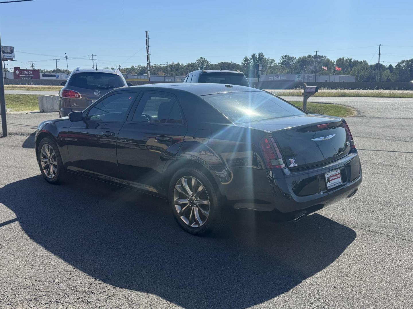 2014 Black Chrysler 300 (2C3CCAGG4EH) with an V6, 3.6 Liter engine, Automatic, 8-Spd transmission, located at 8008 Warden Rd, Sherwood, AR, 72120, (501) 801-6100, 34.830078, -92.186684 - Photo#5