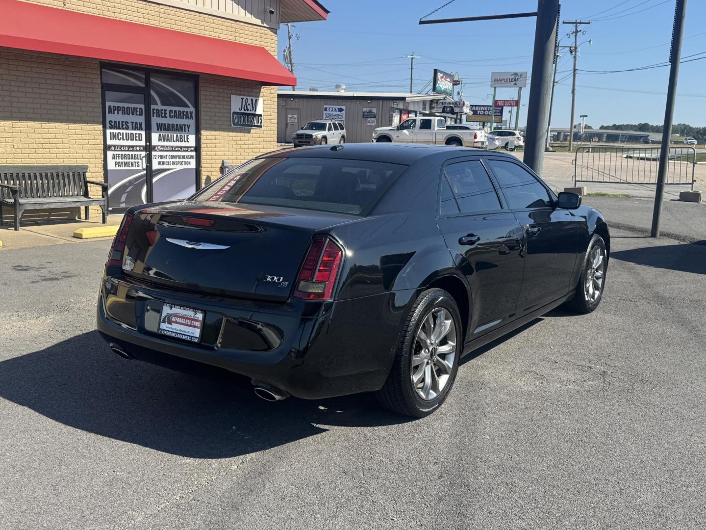 2014 Black Chrysler 300 (2C3CCAGG4EH) with an V6, 3.6 Liter engine, Automatic, 8-Spd transmission, located at 8008 Warden Rd, Sherwood, AR, 72120, (501) 801-6100, 34.830078, -92.186684 - Photo#7