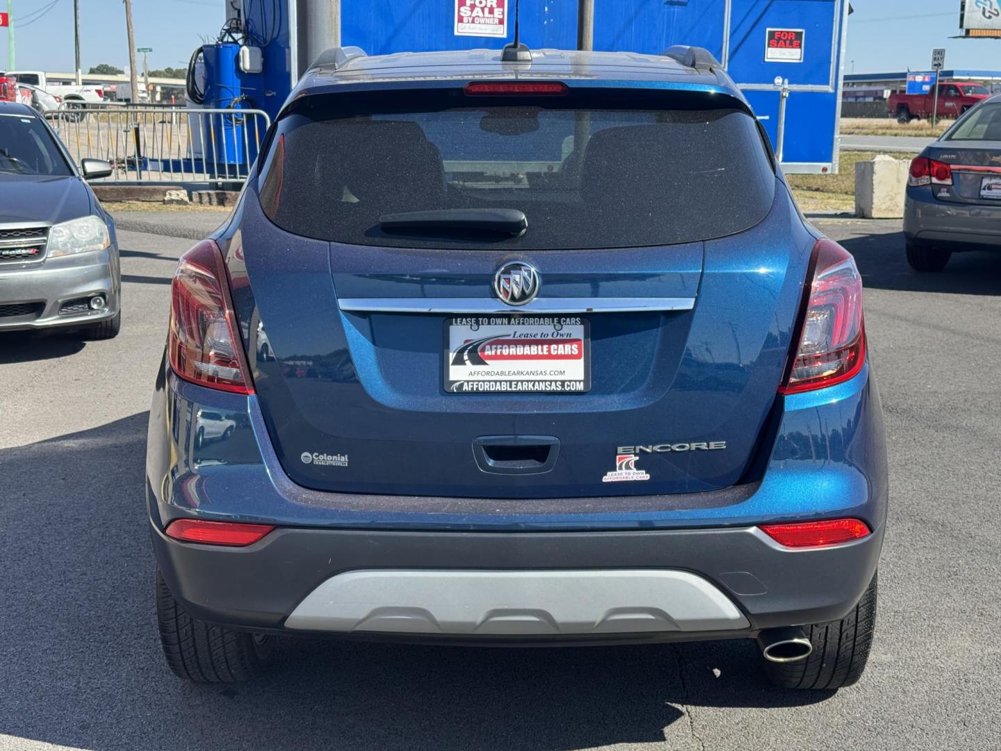 2019 Blue Buick Encore (KL4CJASB7KB) with an 4-Cyl, ECOTEC, Turbo, 1.4 Liter engine, Automatic, 6-Spd w/Overdrive and Shift Control transmission, located at 8008 Warden Rd, Sherwood, AR, 72120, (501) 801-6100, 34.830078, -92.186684 - Photo#5