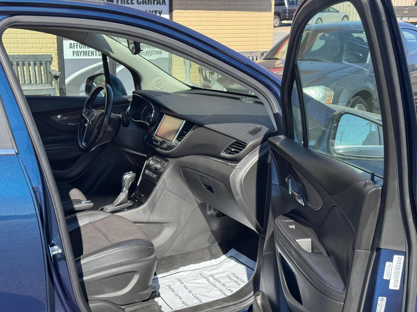 2019 Blue Buick Encore (KL4CJASB7KB) with an 4-Cyl, ECOTEC, Turbo, 1.4 Liter engine, Automatic, 6-Spd w/Overdrive and Shift Control transmission, located at 8008 Warden Rd, Sherwood, AR, 72120, (501) 801-6100, 34.830078, -92.186684 - Photo#8