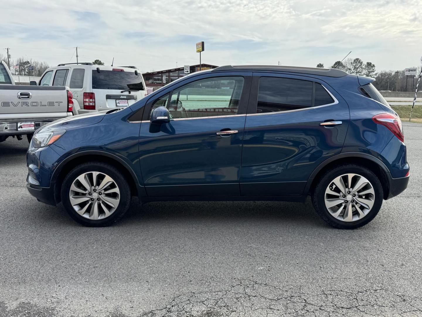 2019 Blue Buick Encore (KL4CJASB7KB) with an 4-Cyl, ECOTEC, Turbo, 1.4 Liter engine, Automatic, 6-Spd w/Overdrive and Shift Control transmission, located at 8008 Warden Rd, Sherwood, AR, 72120, (501) 801-6100, 34.830078, -92.186684 - Photo#4