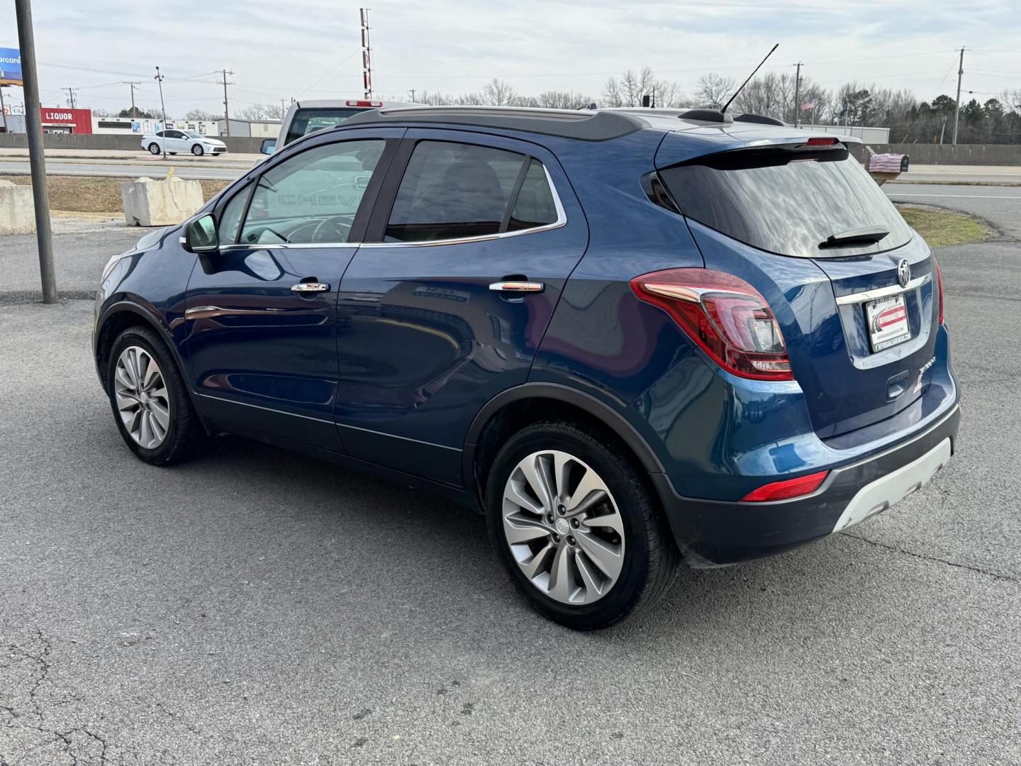 2019 Blue Buick Encore (KL4CJASB7KB) with an 4-Cyl, ECOTEC, Turbo, 1.4 Liter engine, Automatic, 6-Spd w/Overdrive and Shift Control transmission, located at 8008 Warden Rd, Sherwood, AR, 72120, (501) 801-6100, 34.830078, -92.186684 - Photo#5