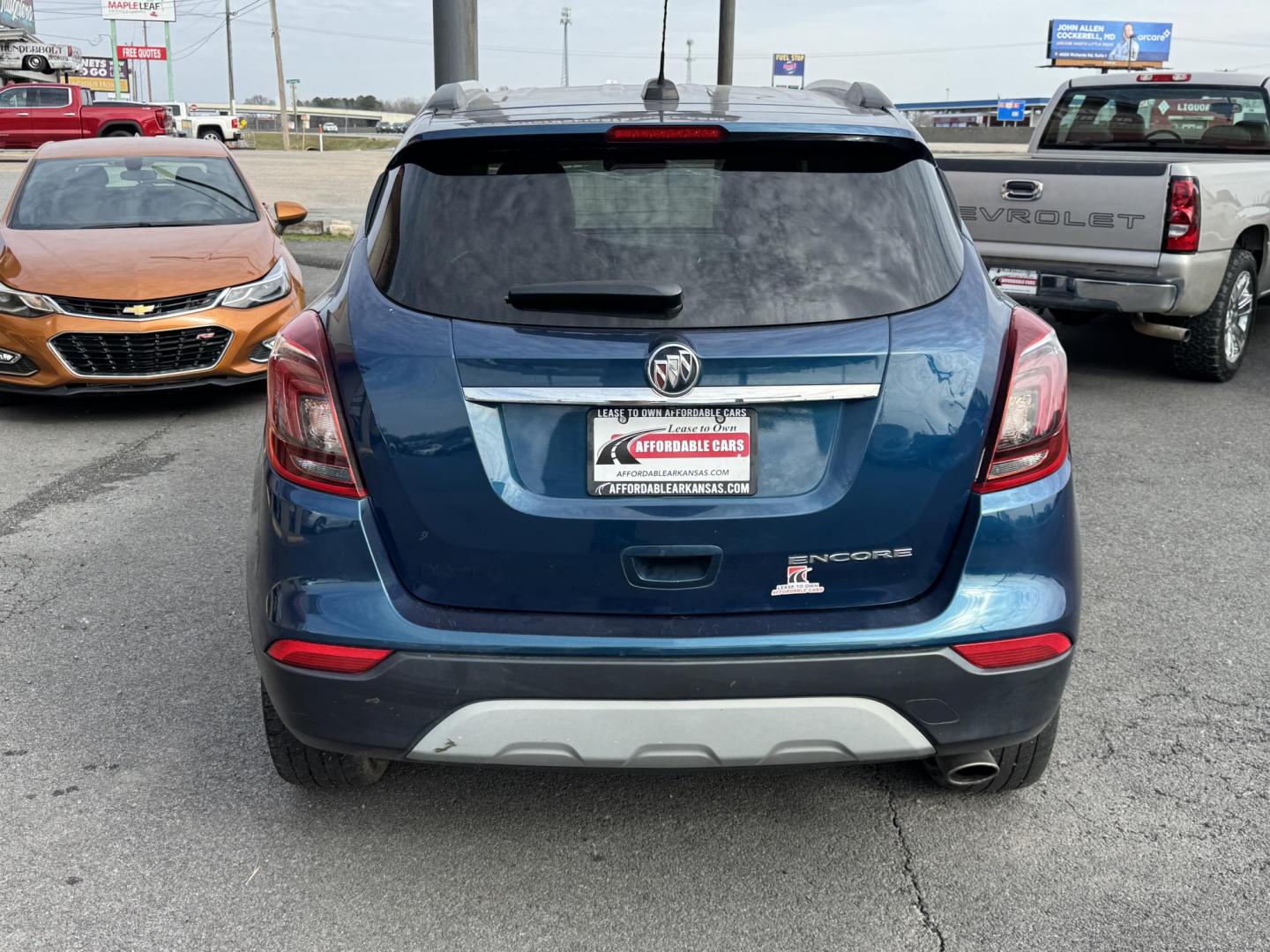 2019 Blue Buick Encore (KL4CJASB7KB) with an 4-Cyl, ECOTEC, Turbo, 1.4 Liter engine, Automatic, 6-Spd w/Overdrive and Shift Control transmission, located at 8008 Warden Rd, Sherwood, AR, 72120, (501) 801-6100, 34.830078, -92.186684 - Photo#6