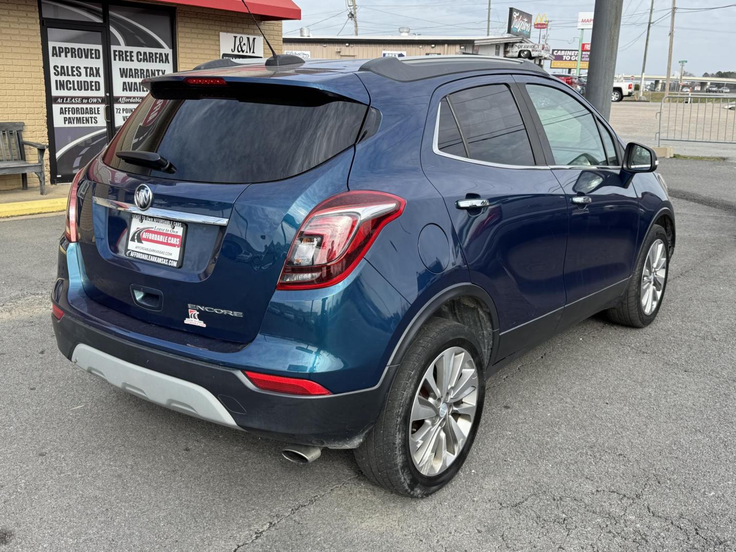 2019 Blue Buick Encore (KL4CJASB7KB) with an 4-Cyl, ECOTEC, Turbo, 1.4 Liter engine, Automatic, 6-Spd w/Overdrive and Shift Control transmission, located at 8008 Warden Rd, Sherwood, AR, 72120, (501) 801-6100, 34.830078, -92.186684 - Photo#7