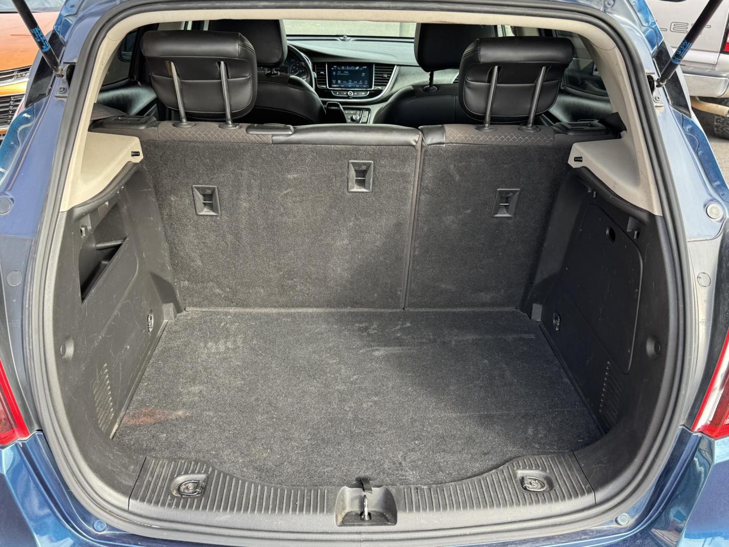 2019 Blue Buick Encore (KL4CJASB7KB) with an 4-Cyl, ECOTEC, Turbo, 1.4 Liter engine, Automatic, 6-Spd w/Overdrive and Shift Control transmission, located at 8008 Warden Rd, Sherwood, AR, 72120, (501) 801-6100, 34.830078, -92.186684 - Photo#10