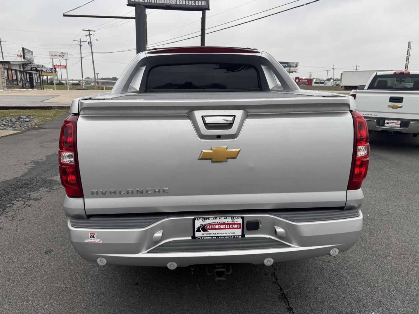 2013 Silver Chevrolet Avalanche (3GNMCEE00DG) with an V8, Flex Fuel, 5.3 Liter engine, Automatic, 6-Spd transmission, located at 8008 Warden Rd, Sherwood, AR, 72120, (501) 801-6100, 34.830078, -92.186684 - Photo#6