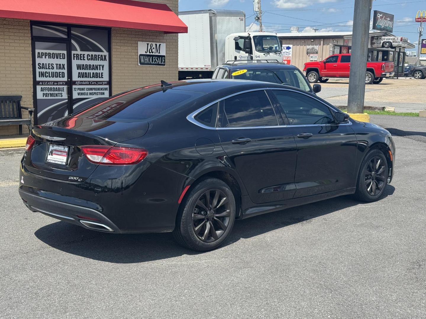 2015 Black Chrysler 200 (1C3CCCCGXFN) with an 4-Cyl, MultiAir PZEV 2.4L engine, Automatic, 9-Spd transmission, located at 8008 Warden Rd, Sherwood, AR, 72120, (501) 801-6100, 34.830078, -92.186684 - Photo#7