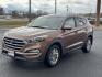 2016 Brown Hyundai Tucson (KM8J33A47GU) with an 4-Cyl, 2.0 Liter engine, Auto, 6-Spd Shiftronic transmission, located at 8008 Warden Rd, Sherwood, AR, 72120, (501) 801-6100, 34.830078, -92.186684 - Photo#3