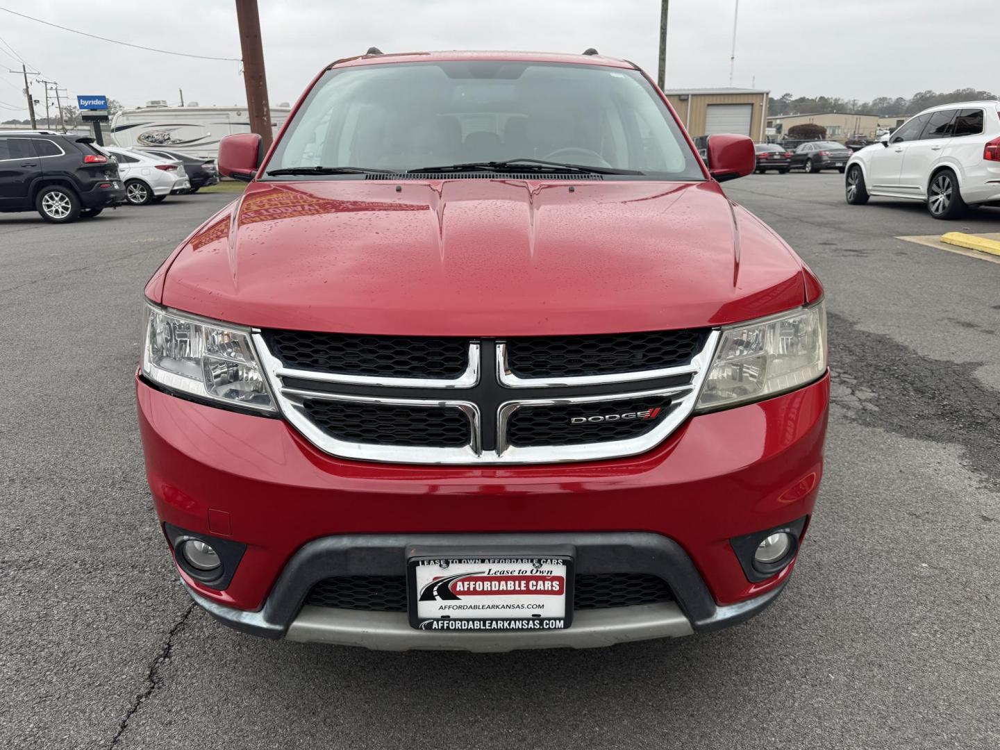 2016 Red Dodge Journey (3C4PDCBBXGT) with an 4-Cyl, 2.4 Liter engine, Auto, 6-Spd AutoStick transmission, located at 8008 Warden Rd, Sherwood, AR, 72120, (501) 801-6100, 34.830078, -92.186684 - Photo#2