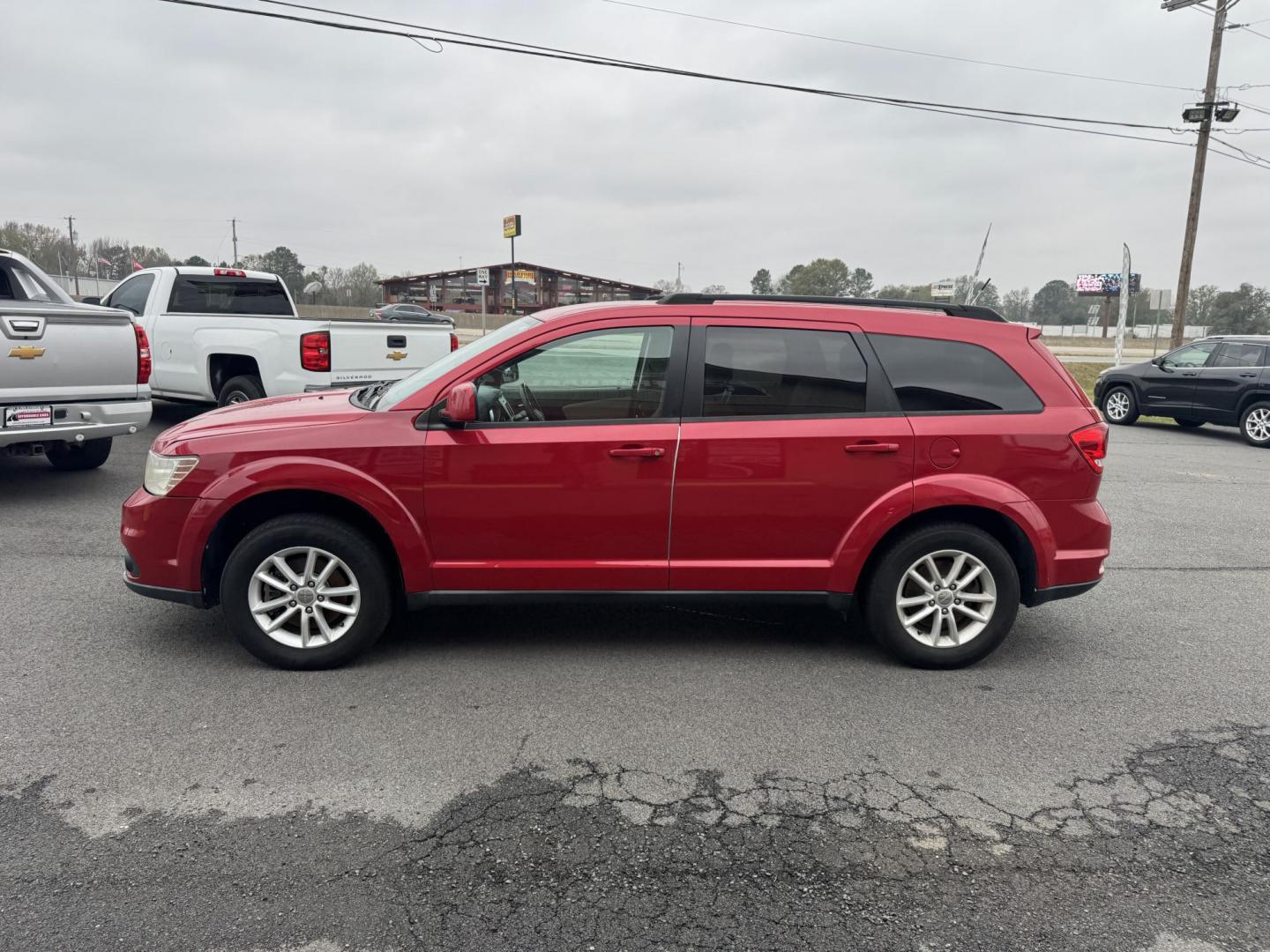2016 Red Dodge Journey (3C4PDCBBXGT) with an 4-Cyl, 2.4 Liter engine, Auto, 6-Spd AutoStick transmission, located at 8008 Warden Rd, Sherwood, AR, 72120, (501) 801-6100, 34.830078, -92.186684 - Photo#4