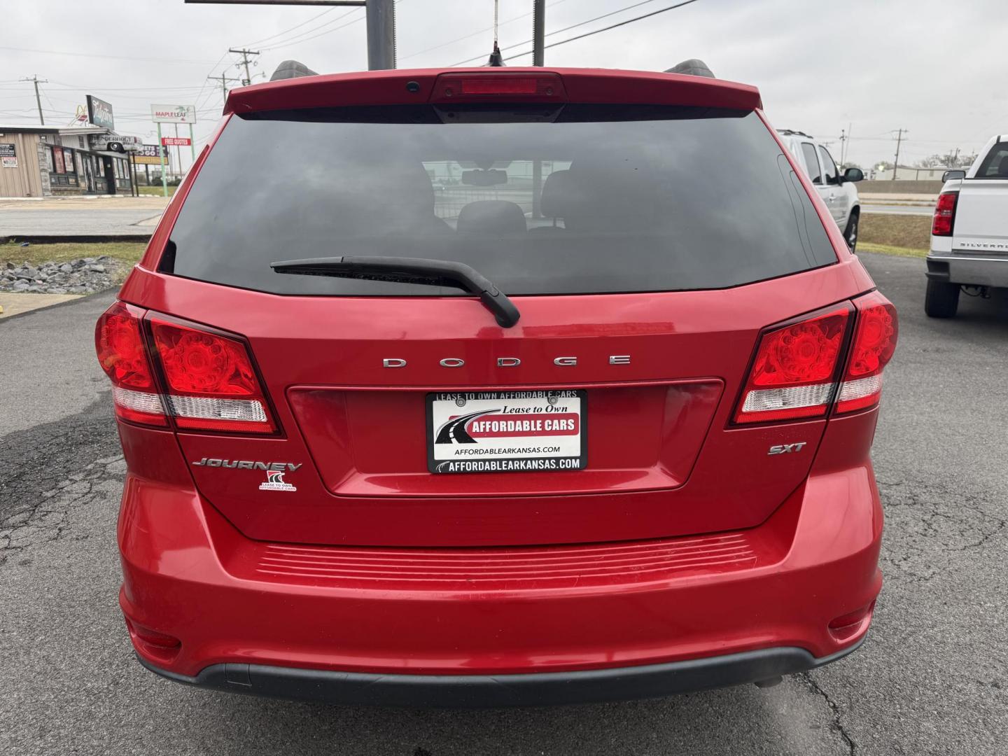 2016 Red Dodge Journey (3C4PDCBBXGT) with an 4-Cyl, 2.4 Liter engine, Auto, 6-Spd AutoStick transmission, located at 8008 Warden Rd, Sherwood, AR, 72120, (501) 801-6100, 34.830078, -92.186684 - Photo#6