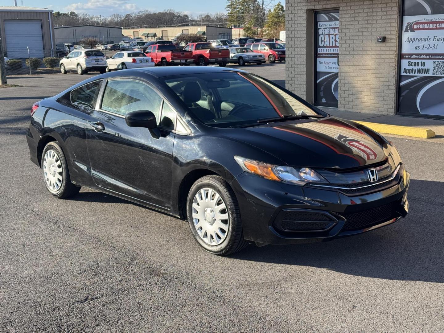 2015 Black Honda Civic (2HGFG3B51FH) with an 4-Cyl, i-VTEC, 1.8 Liter engine, Automatic, CVT transmission, located at 8008 Warden Rd, Sherwood, AR, 72120, (501) 801-6100, 34.830078, -92.186684 - Photo#2
