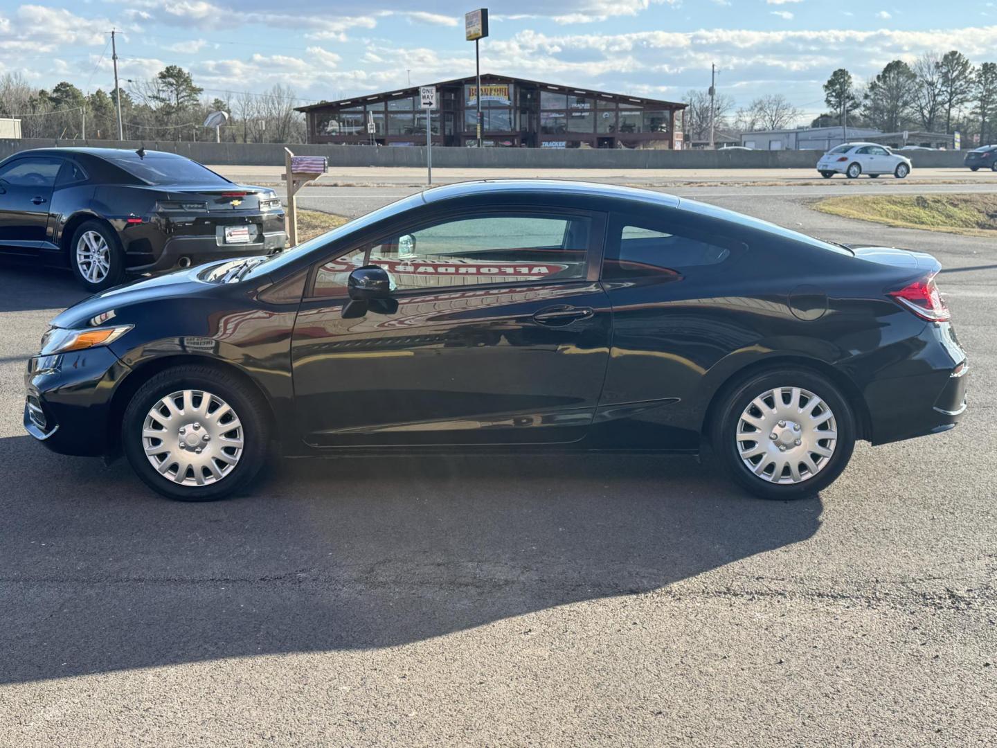 2015 Black Honda Civic (2HGFG3B51FH) with an 4-Cyl, i-VTEC, 1.8 Liter engine, Automatic, CVT transmission, located at 8008 Warden Rd, Sherwood, AR, 72120, (501) 801-6100, 34.830078, -92.186684 - Photo#3