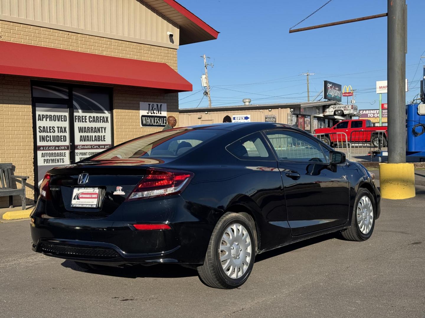 2015 Black Honda Civic (2HGFG3B51FH) with an 4-Cyl, i-VTEC, 1.8 Liter engine, Automatic, CVT transmission, located at 8008 Warden Rd, Sherwood, AR, 72120, (501) 801-6100, 34.830078, -92.186684 - Photo#7