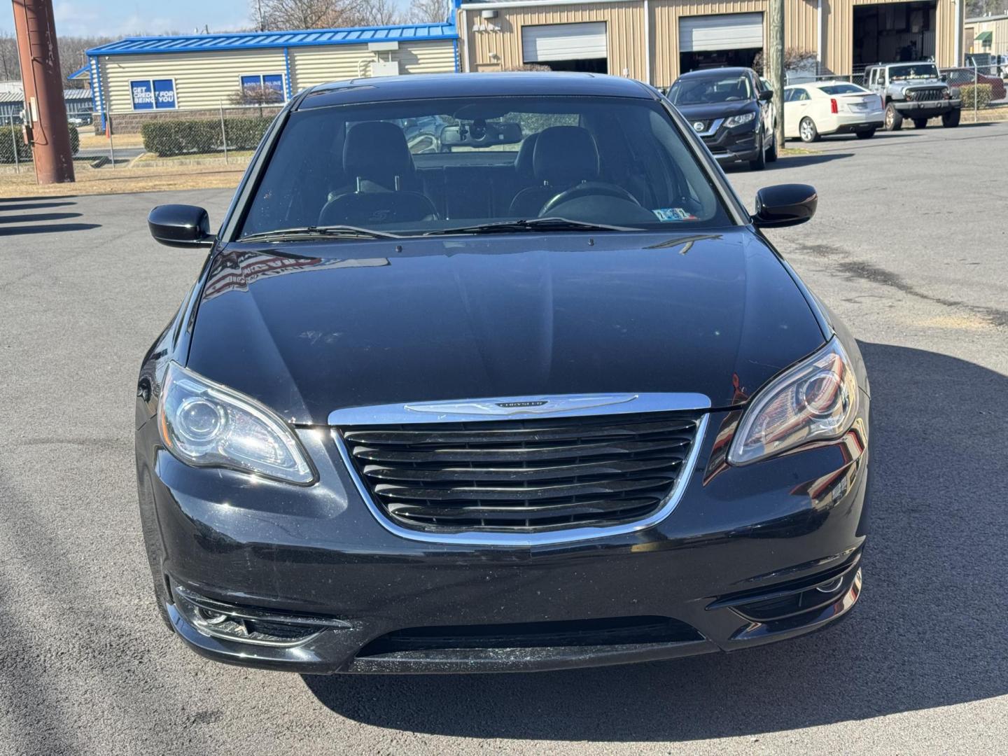 2012 Black Chrysler 200 (1C3CCBHG1CN) with an V6, Flex Fuel, 3.6 Liter engine, Automatic, 6-Spd w/Overdrive and AutoStick transmission, located at 8008 Warden Rd, Sherwood, AR, 72120, (501) 801-6100, 34.830078, -92.186684 - Photo#2