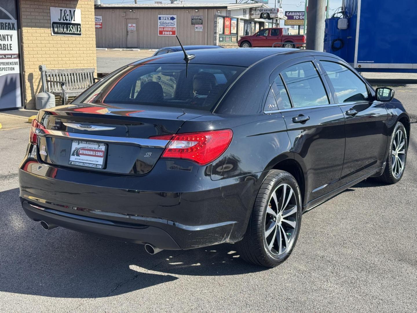 2012 Black Chrysler 200 (1C3CCBHG1CN) with an V6, Flex Fuel, 3.6 Liter engine, Automatic, 6-Spd w/Overdrive and AutoStick transmission, located at 8008 Warden Rd, Sherwood, AR, 72120, (501) 801-6100, 34.830078, -92.186684 - Photo#7