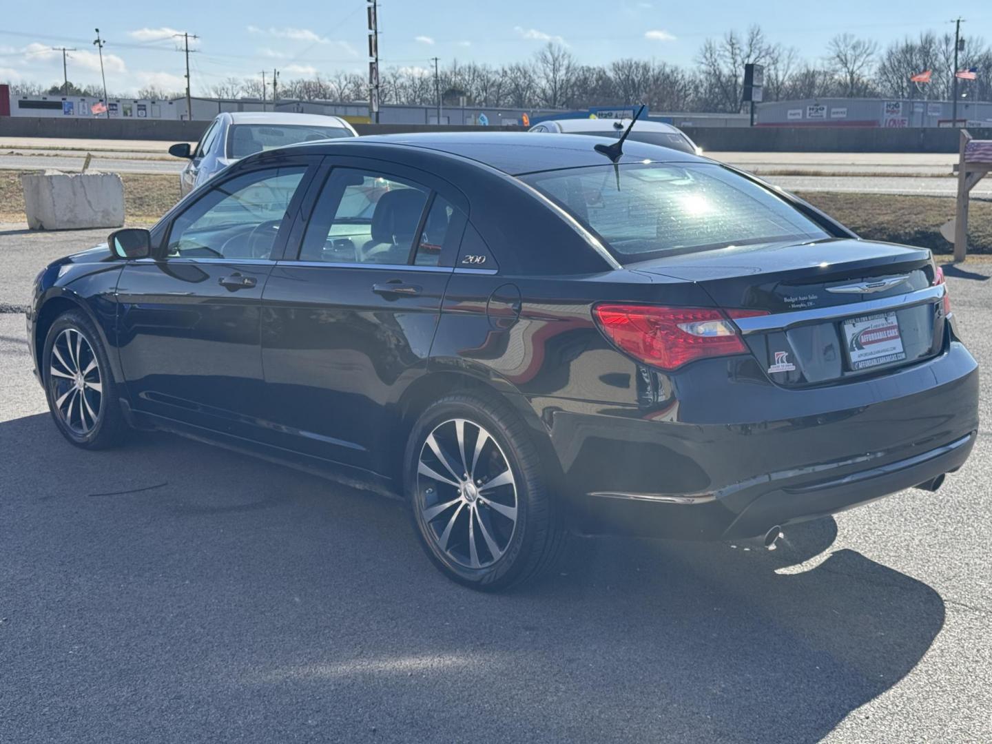 2012 Black Chrysler 200 (1C3CCBHG1CN) with an V6, Flex Fuel, 3.6 Liter engine, Automatic, 6-Spd w/Overdrive and AutoStick transmission, located at 8008 Warden Rd, Sherwood, AR, 72120, (501) 801-6100, 34.830078, -92.186684 - Photo#5