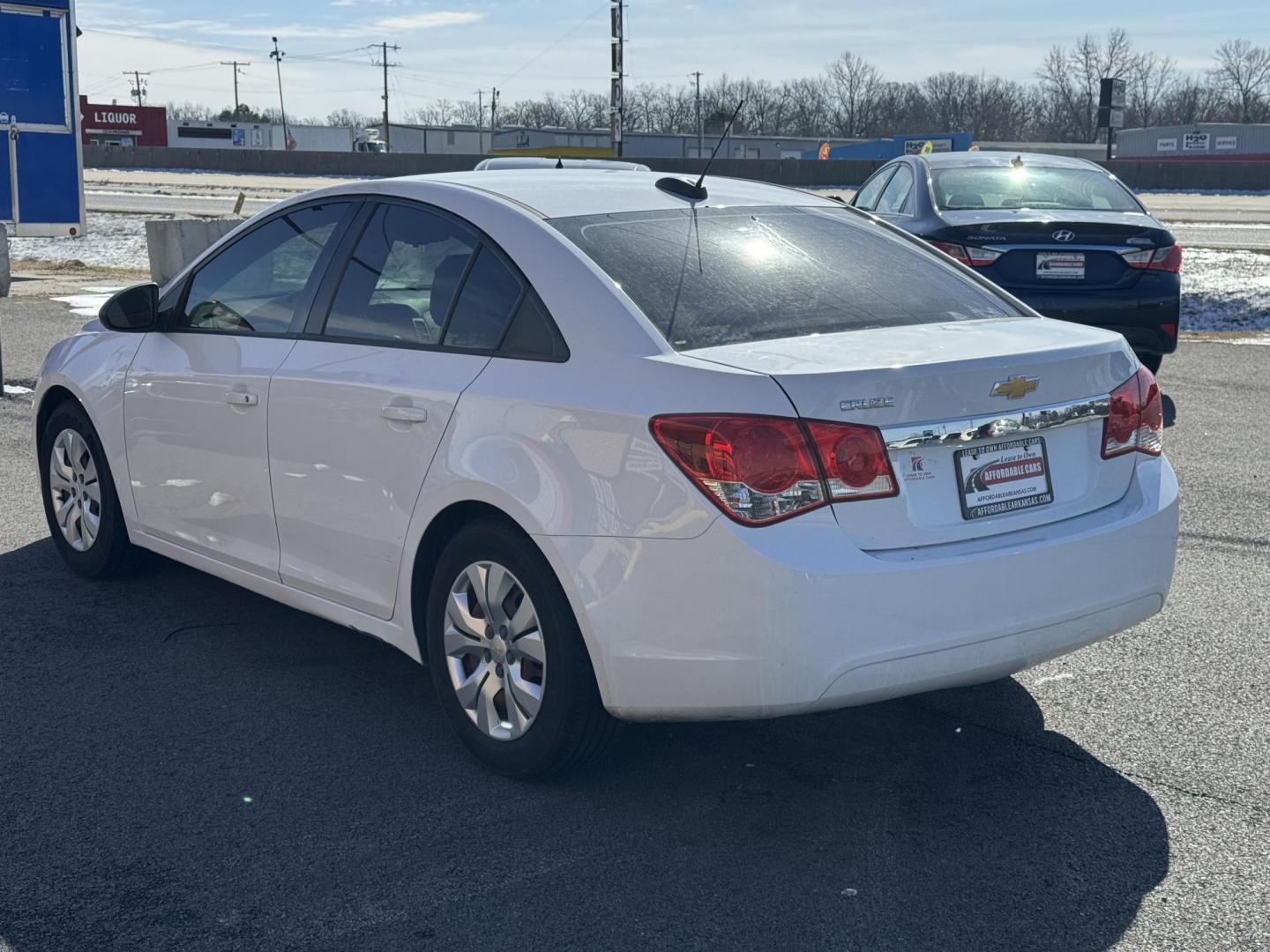 2015 White Chevrolet Cruze (1G1PA5SH2F7) with an 4-Cyl, ECOTEC, 1.8 Liter engine, Auto, 6-Spd Overdrive transmission, located at 8008 Warden Rd, Sherwood, AR, 72120, (501) 801-6100, 34.830078, -92.186684 - Photo#5