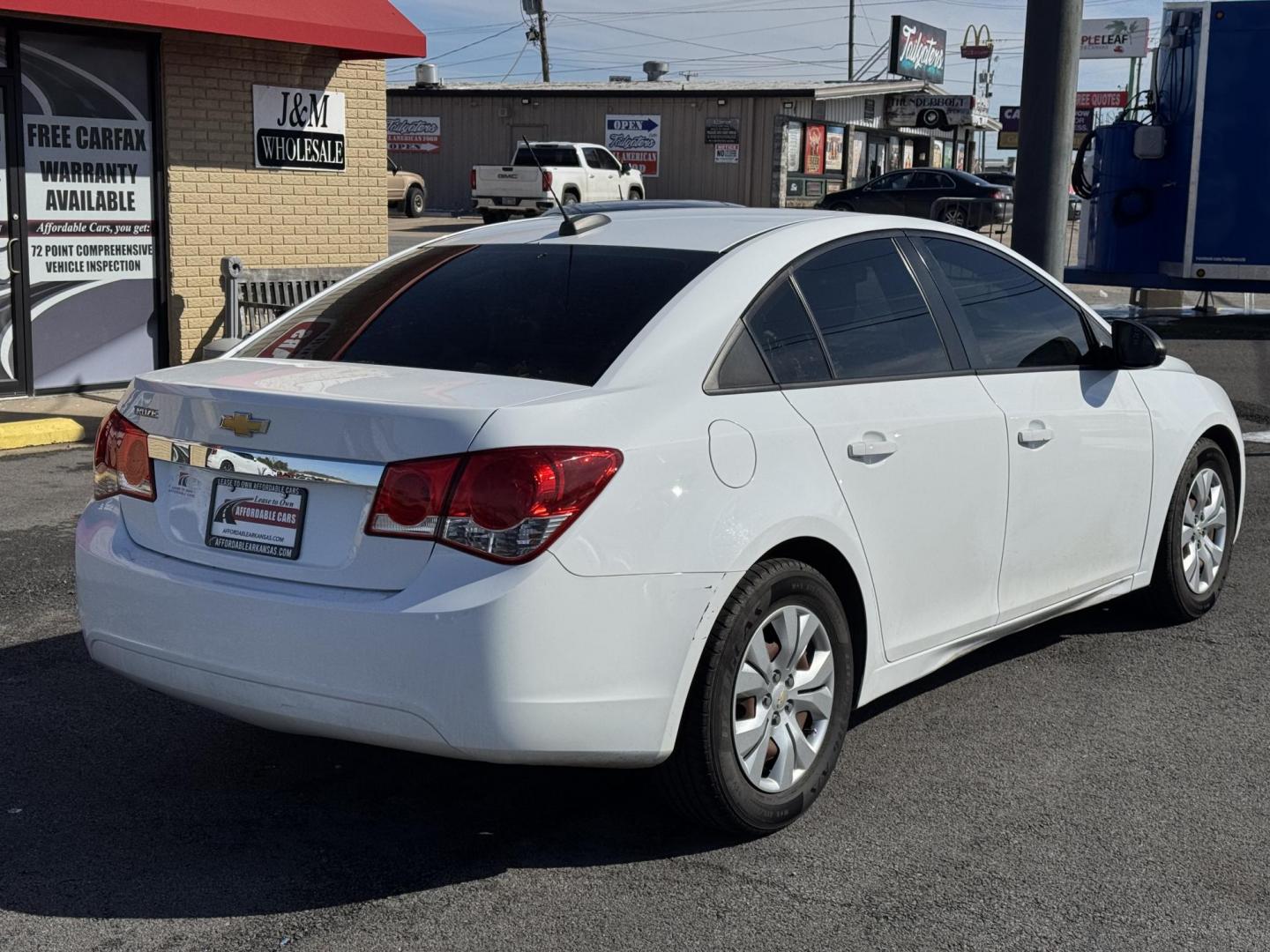 2015 White Chevrolet Cruze (1G1PA5SH2F7) with an 4-Cyl, ECOTEC, 1.8 Liter engine, Auto, 6-Spd Overdrive transmission, located at 8008 Warden Rd, Sherwood, AR, 72120, (501) 801-6100, 34.830078, -92.186684 - Photo#7
