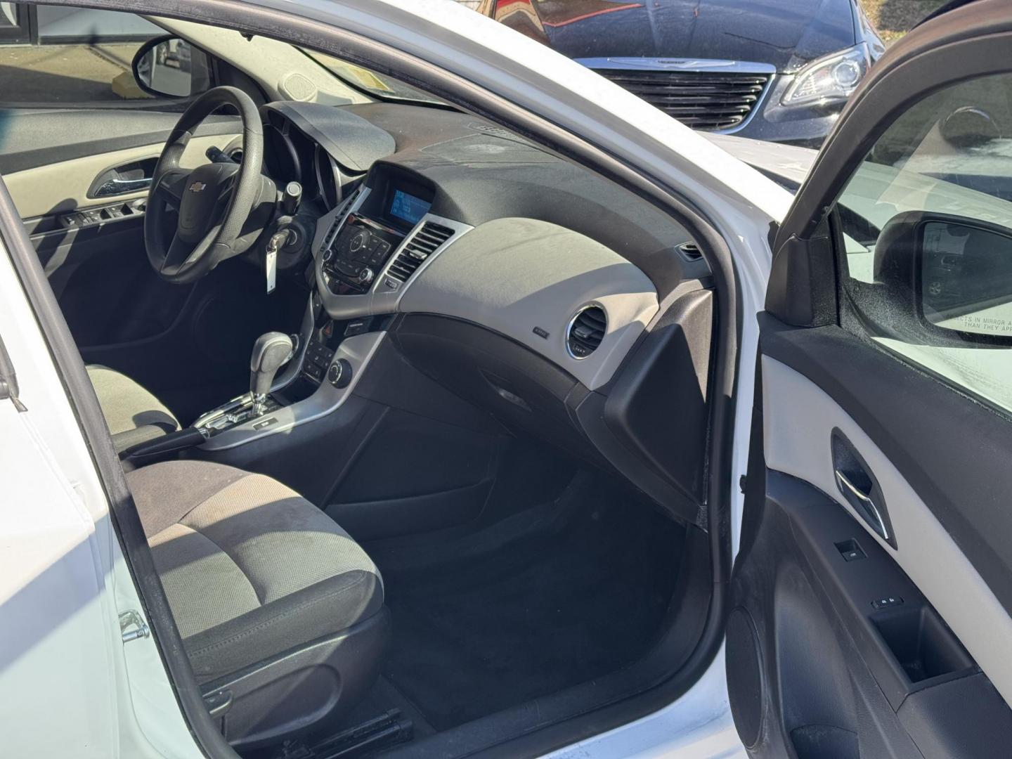 2015 White Chevrolet Cruze (1G1PA5SH2F7) with an 4-Cyl, ECOTEC, 1.8 Liter engine, Auto, 6-Spd Overdrive transmission, located at 8008 Warden Rd, Sherwood, AR, 72120, (501) 801-6100, 34.830078, -92.186684 - Photo#8
