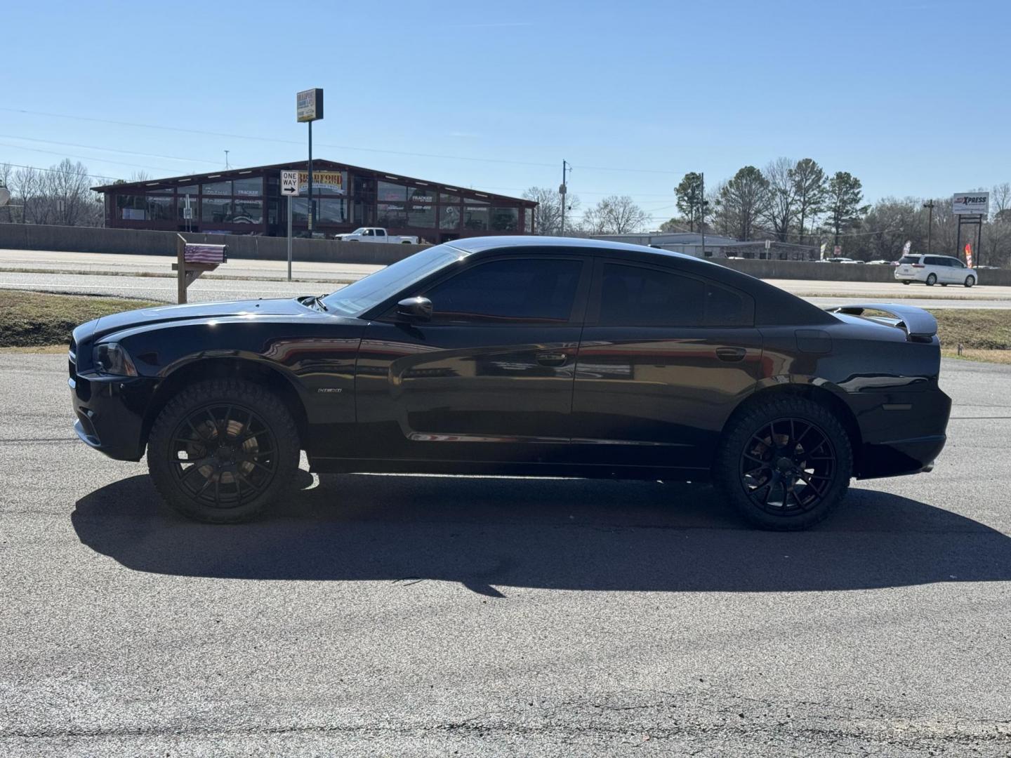 2014 Black Dodge Charger (2C3CDXDT5EH) with an V8, HEMI, 5.7 Liter engine, Automatic, 5-Spd transmission, located at 8008 Warden Rd, Sherwood, AR, 72120, (501) 801-6100, 34.830078, -92.186684 - Photo#4