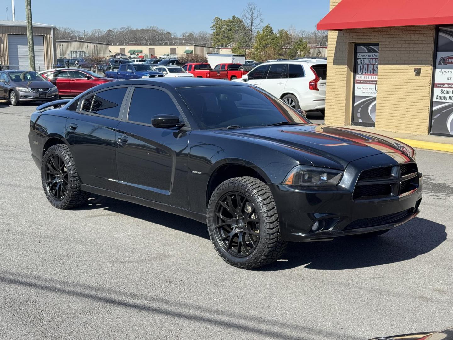 2014 Black Dodge Charger (2C3CDXDT5EH) with an V8, HEMI, 5.7 Liter engine, Automatic, 5-Spd transmission, located at 8008 Warden Rd, Sherwood, AR, 72120, (501) 801-6100, 34.830078, -92.186684 - Photo#1