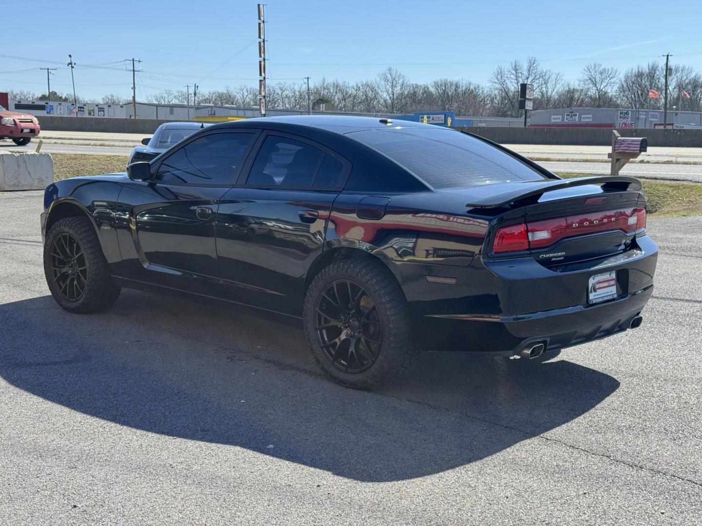 2014 Black Dodge Charger (2C3CDXDT5EH) with an V8, HEMI, 5.7 Liter engine, Automatic, 5-Spd transmission, located at 8008 Warden Rd, Sherwood, AR, 72120, (501) 801-6100, 34.830078, -92.186684 - Photo#5