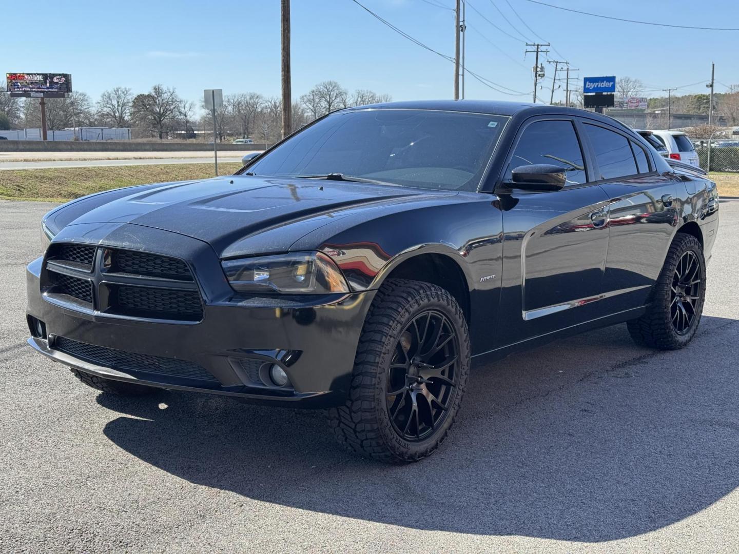 2014 Black Dodge Charger (2C3CDXDT5EH) with an V8, HEMI, 5.7 Liter engine, Automatic, 5-Spd transmission, located at 8008 Warden Rd, Sherwood, AR, 72120, (501) 801-6100, 34.830078, -92.186684 - Photo#3