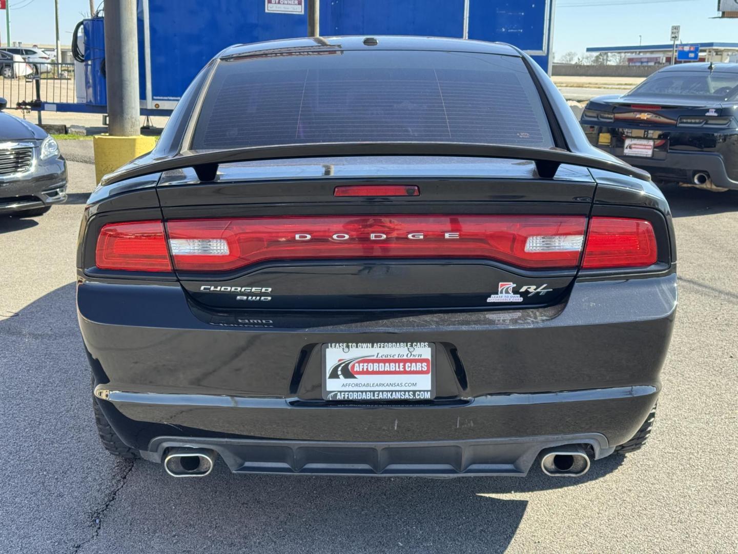 2014 Black Dodge Charger (2C3CDXDT5EH) with an V8, HEMI, 5.7 Liter engine, Automatic, 5-Spd transmission, located at 8008 Warden Rd, Sherwood, AR, 72120, (501) 801-6100, 34.830078, -92.186684 - Photo#6
