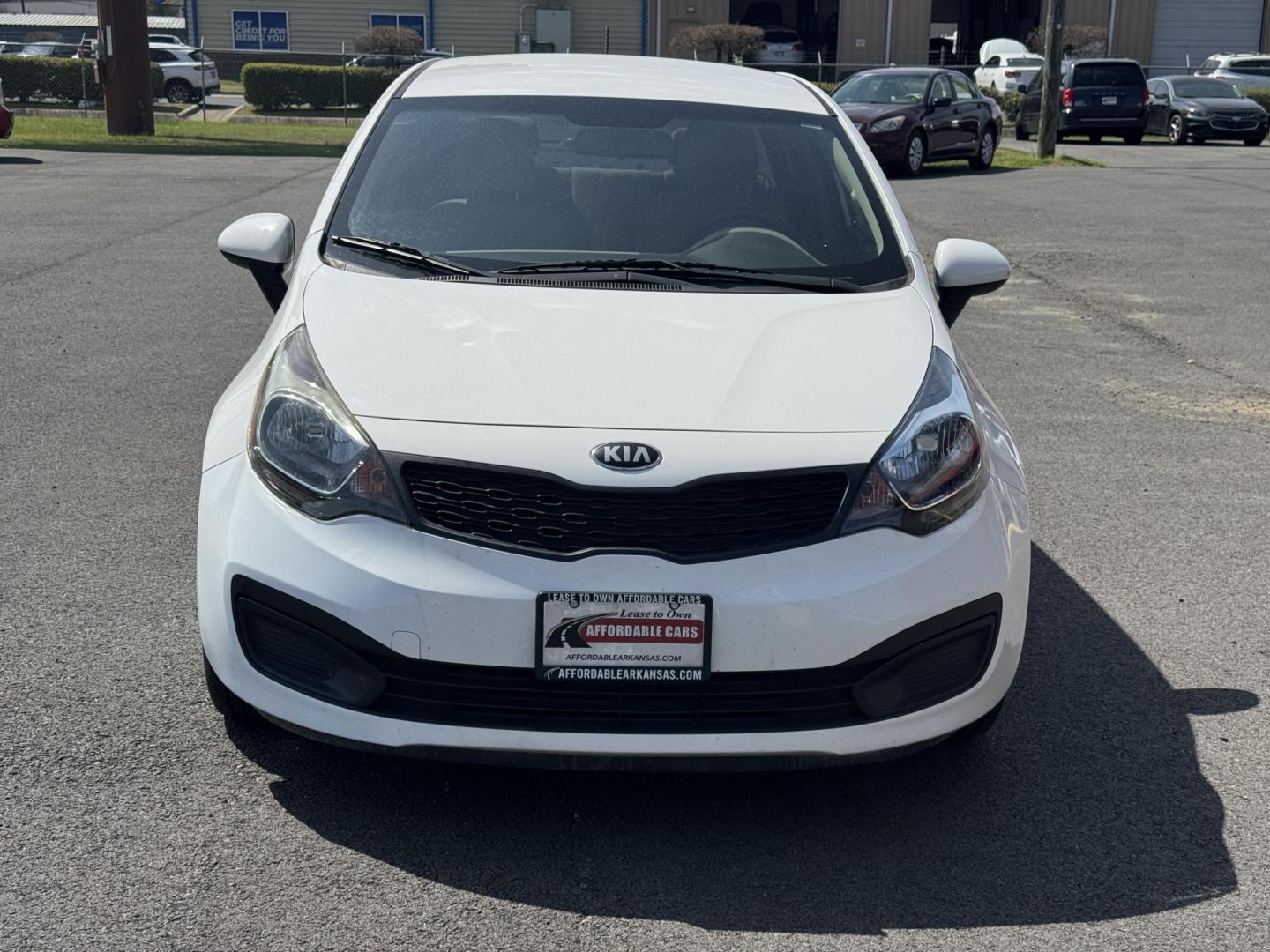 2013 White Kia Rio (KNADM4A34D6) with an 4-Cyl, 1.6 Liter engine, Automatic, 6-Spd transmission, located at 8008 Warden Rd, Sherwood, AR, 72120, (501) 801-6100, 34.830078, -92.186684 - Photo#2