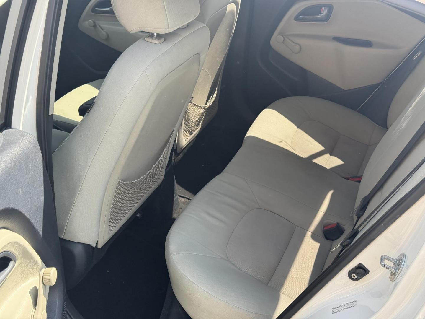 2013 White Kia Rio (KNADM4A34D6) with an 4-Cyl, 1.6 Liter engine, Automatic, 6-Spd transmission, located at 8008 Warden Rd, Sherwood, AR, 72120, (501) 801-6100, 34.830078, -92.186684 - Photo#11