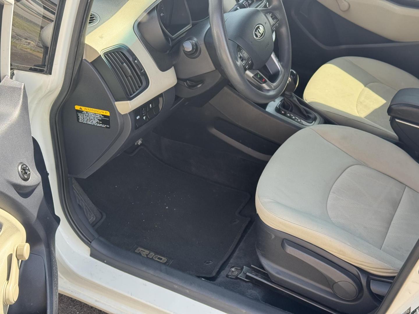 2013 White Kia Rio (KNADM4A34D6) with an 4-Cyl, 1.6 Liter engine, Automatic, 6-Spd transmission, located at 8008 Warden Rd, Sherwood, AR, 72120, (501) 801-6100, 34.830078, -92.186684 - Photo#12